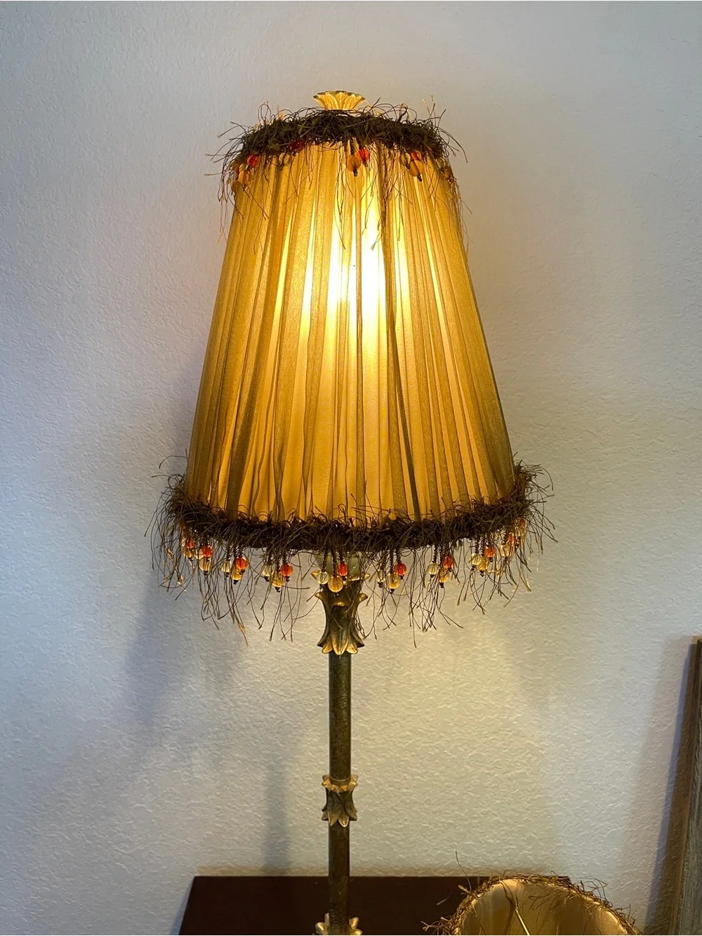 Vintage Victorian-style fringed beaded lampshade with a pleated, shimmery fabric